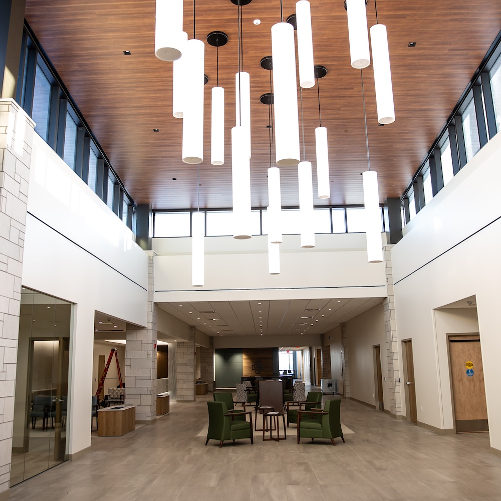 The atrium at Lafayette Hospital + Clinics featuring dramatic ceiling lights